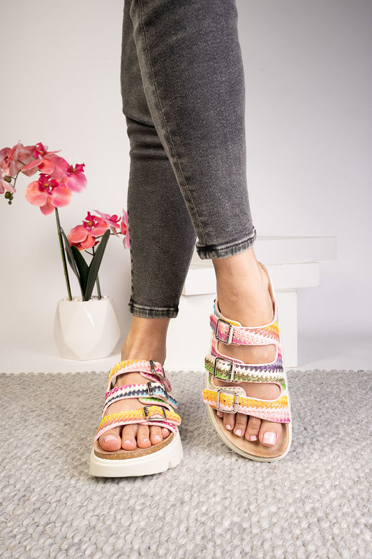 Corkys multi strap platform sandals with colorful woven straps, adjustable buckles, and cushioned footbed