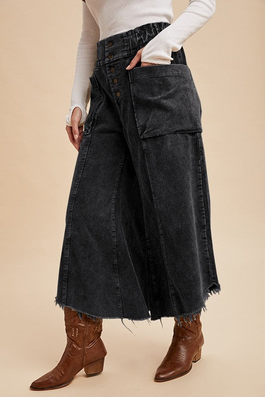 Mineral Washed Corduroy pants with button closure. These pants feature a cropped fit with a raw-edge hem detail. Perfect addition to yoour Fall Wardrobe.