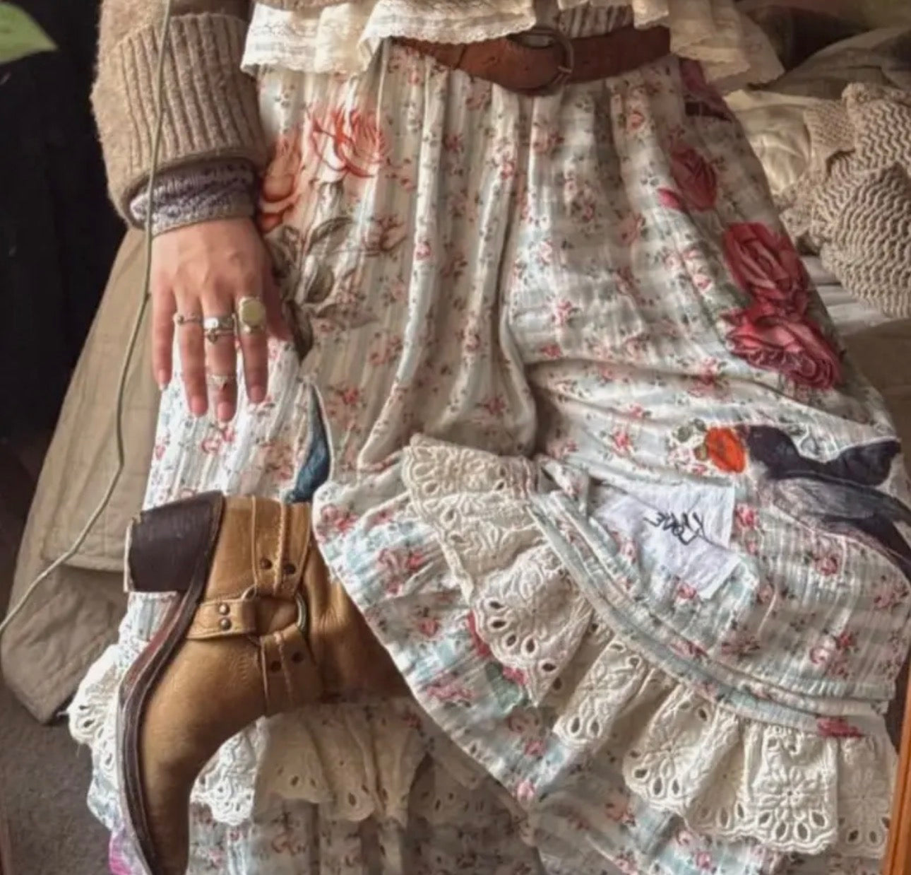 Boho patchwork bloomers with lace trim, floral fabric details, and relaxed drawstring waist styled with boots