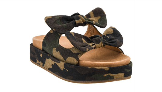 Camo Corkys platform sandals with knotted straps, 1.5 inch flatform sole, and cushioned neoprene insole in women’s sizes 7 to 11