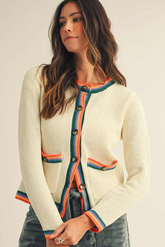 We are Loving the Rainbow pattern. Cute and comfortable Cardigan with functional pockets and buttons going down the front. True to Size Fit.