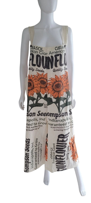 Vintage print Overalls. 100% Cotton. Sunflower Prints would Look Adorable back with a Denim Jacket. This Item does have adjustable Straps.  The Perfect Boho-chic vibe!