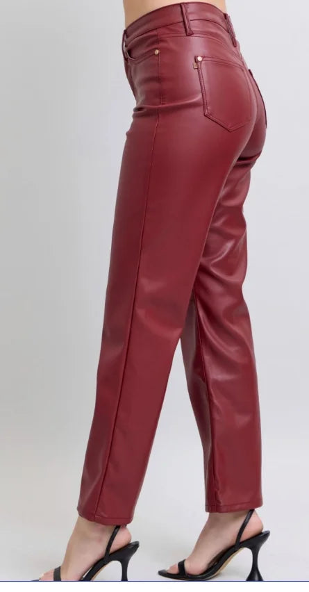 Red faux leather lined pants by Judy Blue with tummy control and sleek fitted silhouette.