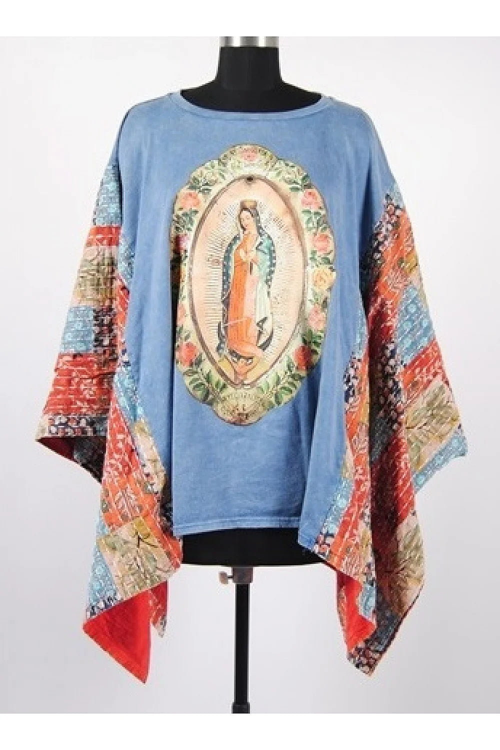Poncho Style top that is sewn at the sides.  This top is not only cute and can be worn with so many various pieces we think it would look great with a pair of wide leg pants or your favortie pair of denim for a fun boho-chic look.
BRAND: BlueVelvet