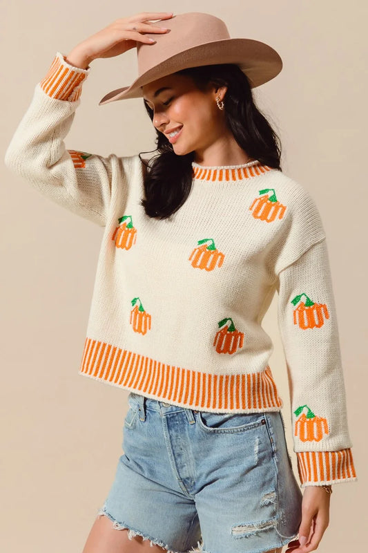 This Pumpkin Sweater we are wearing all of the Fall Season and not just for Halloween. This sweater is  buttery soft and features ribbed sleeves at the wrist for a more tailored look and a ribbed knit hem at the waist.
BRAND: So Me