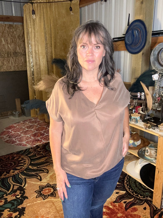 This V-Neck Top, by Dear John, is the perfect addition to your wardrobe. great for layering under your favorite Blazers, Jackets, or Cardigans. You can also wear this piece by itself and still appear very tailored.
BRAND: Dear John