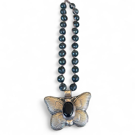 Black onyx Geuine stone set in German Silver Butterly Design.