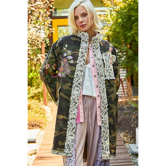 Camouflage Jacket with floral embroidery and raw edge hem. Beautiful crochet detailing with functional pockets. This Jacket is a wonderful statement piece to add to your wardrobe.
BRAND: POL