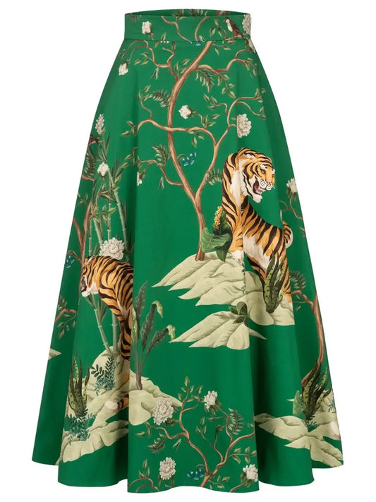 This skirt is a must have in any fashionista’s wardrobe. It is a true statement piece that illuminates class and is very timeless. It features pockets on both sides of hips and a zipper closure in the back. The Tigers, that look as if they had been hand painted on there, against the Kelly green background are stunning. This skirt was made in Germany.
