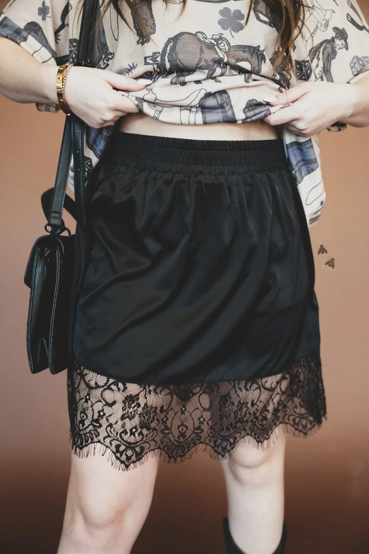 Black My Lace Ex-Tendy skort by 2Fly with stretch waistband, silky fabric and sheer floral lace hem