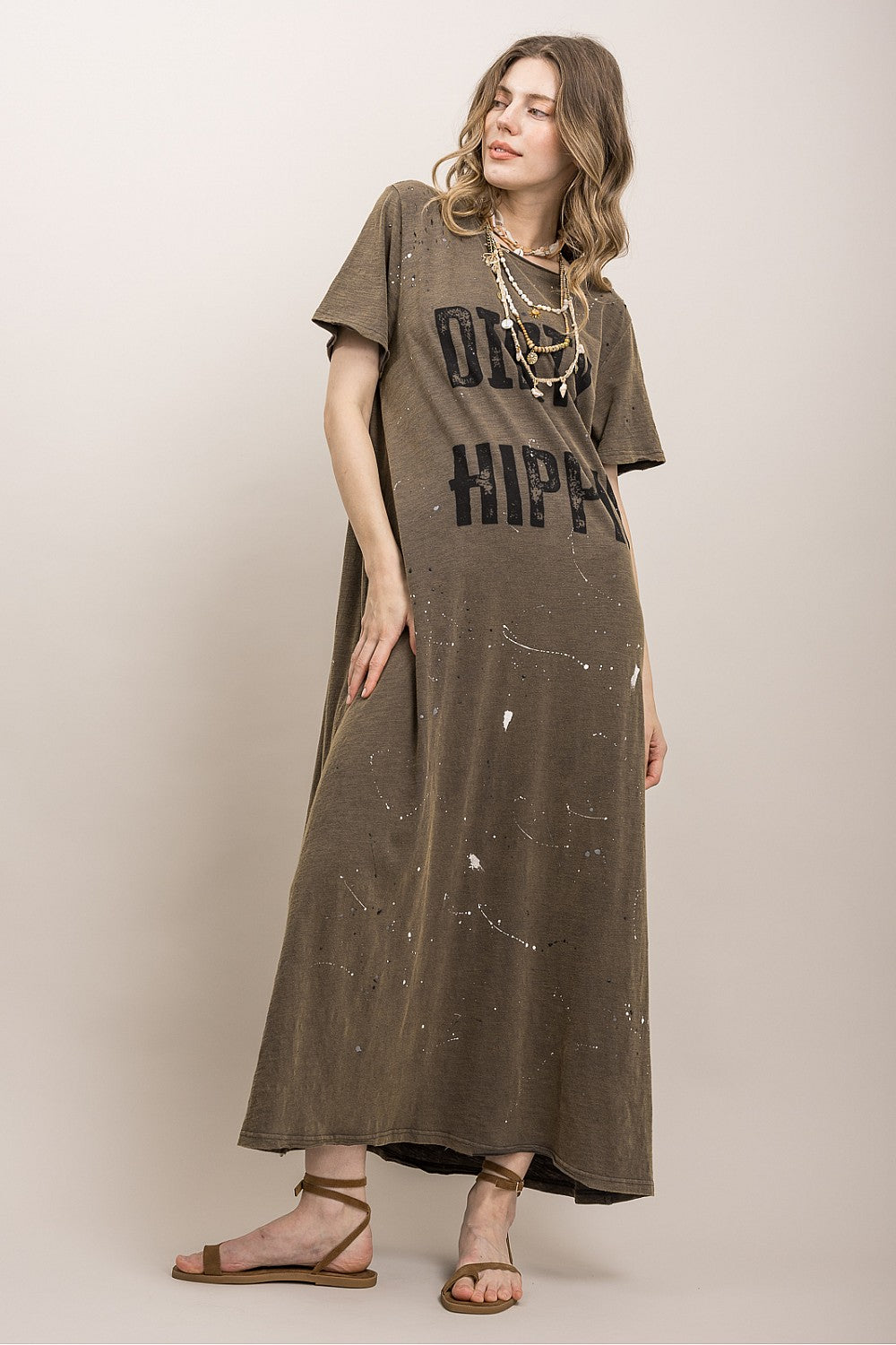 Full-length view of the Dirty Hippie Graphic Maxi Dress by Blue Velvet styled with the Gypsy Soul Disc Belt, layered jewelry, statement earrings, and boho-inspired accessories.