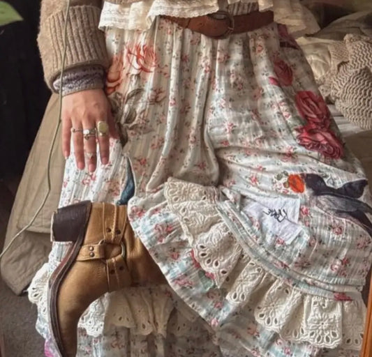Boho patchwork bloomers with lace trim, floral fabric details, and relaxed drawstring waist styled with boots