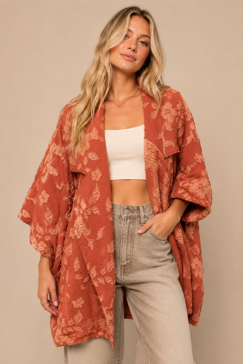 J.NNA Wildflower Reverie brick kimono jacket with raised peach floral appliques, draped lapels and front pockets