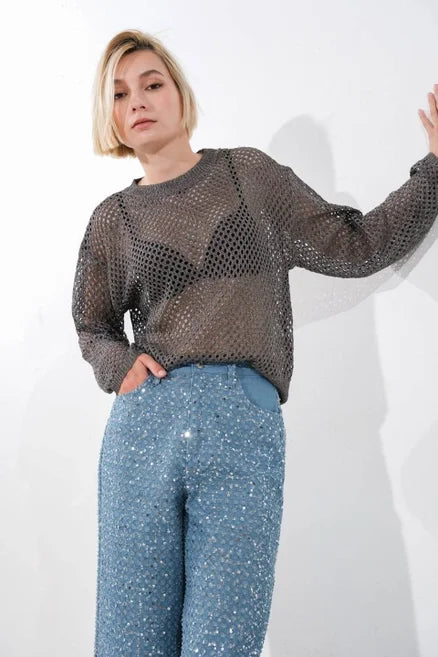 Smoky gray loose knit sweater with silver metallic lurex threading, relaxed fit, and lightweight drape by Free Market