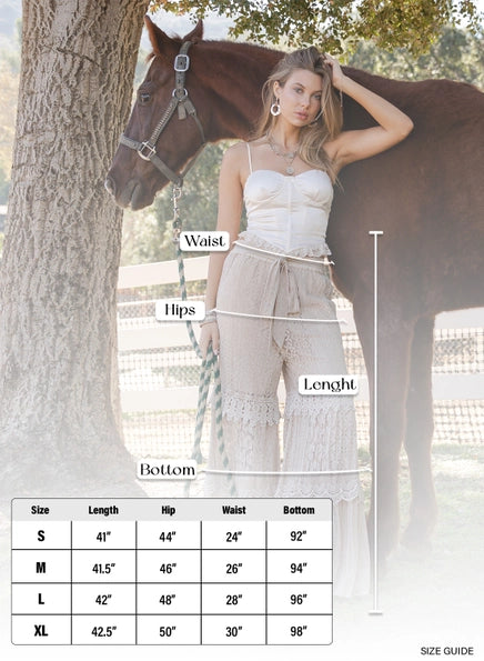 Woman in a white outfit standing next to a horse with measurements labeled, set against a natural background.