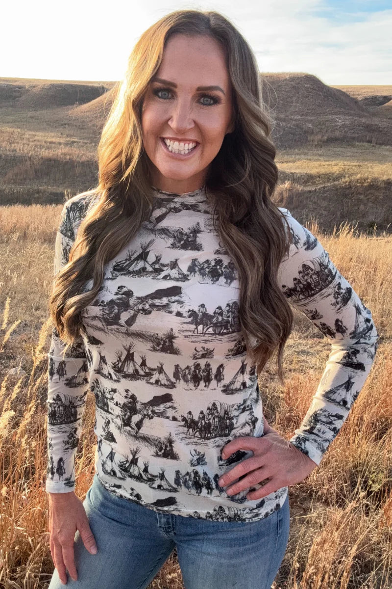 Scenic print mesh long sleeve top by Sterling Kreek with fitted silhouette