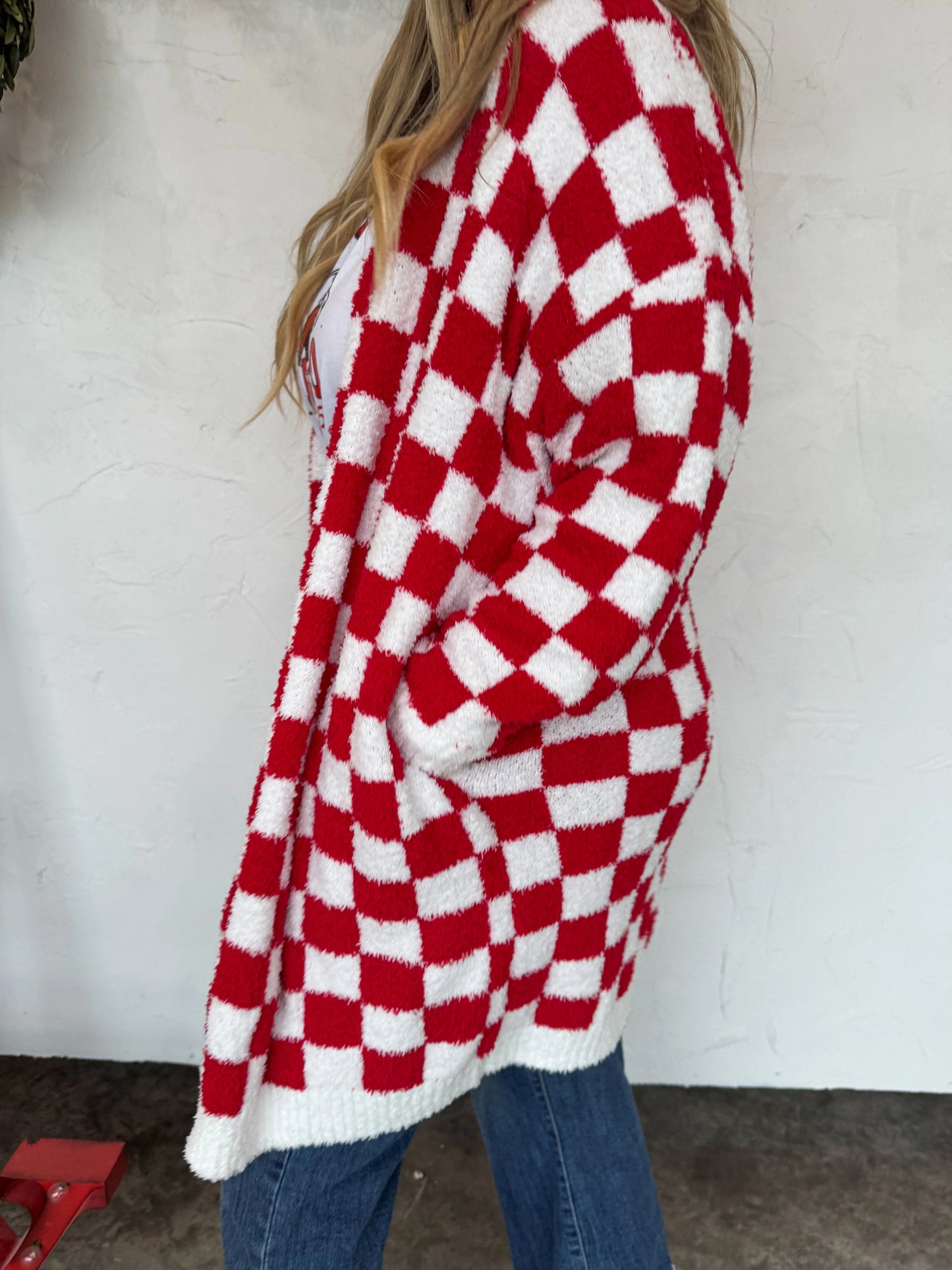 Ultra soft red and white checkered cloud cardigan by Blakeley worn with graphic tee and jeans