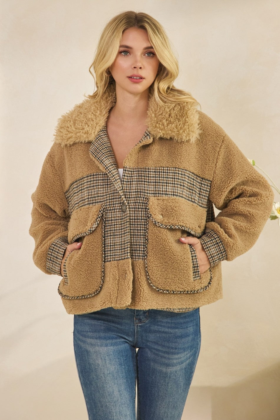 Cozy meets chic. This statement teddy jacket blends timeless houndstooth insets with a soft, shaggy collar for that perfect mix of comfort and sophistication. Designed with oversized front pockets and plush texture, it’s the ultimate throw-on-and-go layer that elevates any outfit.

Details:

Soft teddy fabric with contrast houndstooth inset panels

Shaggy faux-fur collar for added warmth and style

Oversized fit with roomy front pockets

Fully lined for all-day comfort

Style it with: your favorite denim, k